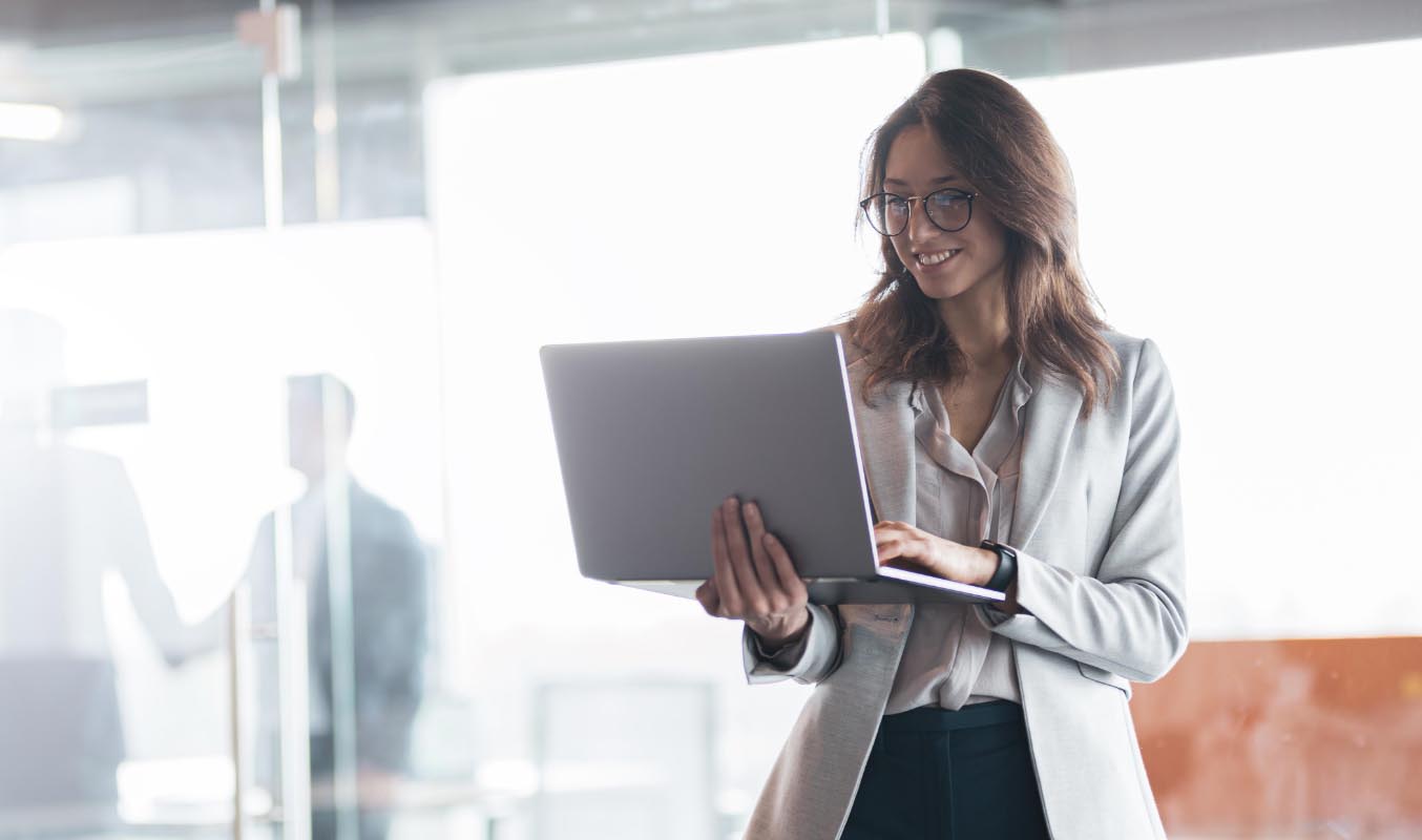 Woman attending a meeting through her laptop